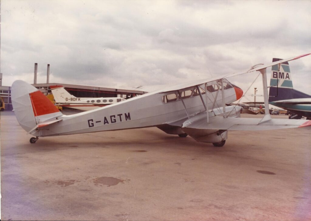 De Havilland D.H.89 Dragon Rapide G-AGTM (built as a military Dominie. NF875, in May 1944.) Seen here at East Midlands Airport on 4th September 1978 prior to a display over the Brush Electrical Machines Gala Day at the Nanpantan Road Sports Ground organised by the Brush Transport Enthusiast’s Club. (Brush Electrical Machines/Brush Transport Enthusiast’s Club – Tony Jarram Collection)